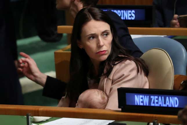 Ardern holds her baby.