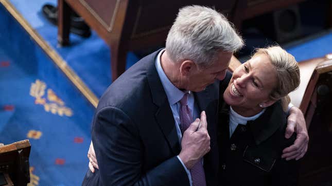 House Speaker Kevin McCarthy (R-Calif.) embraces Rep. Marjorie Taylor Greene (R-Ga.), his biggest fan, on the House Floor.