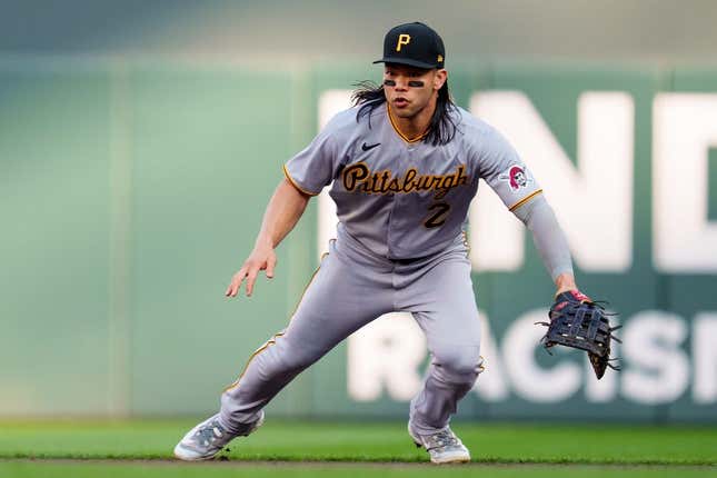 Aug 19, 2023; Minneapolis, Minnesota, USA; Pittsburgh Pirates right fielder Connor Joe (2) reacts to a hit ball against the Minnesota Twins in the first inning at Target Field.