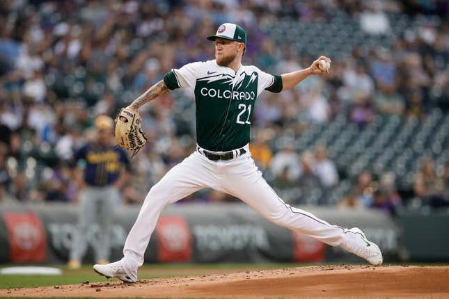 May 3, 2023; Denver, Colorado, USA; Colorado Rockies starting pitcher Kyle Freeland (21) pitches in the second inning against the Milwaukee Brewers at Coors Field.