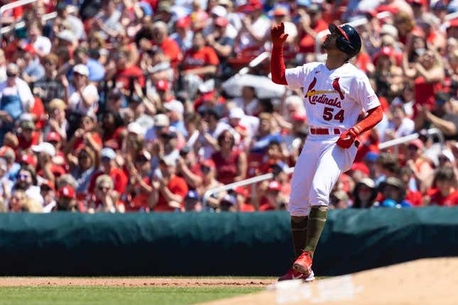 May 21, 2023; St. Louis, Missouri, USA; St. Louis Cardinals scar Mercado (54) hits a single against the Los Angeles Dodgers in the fourth inning at Busch Stadium.