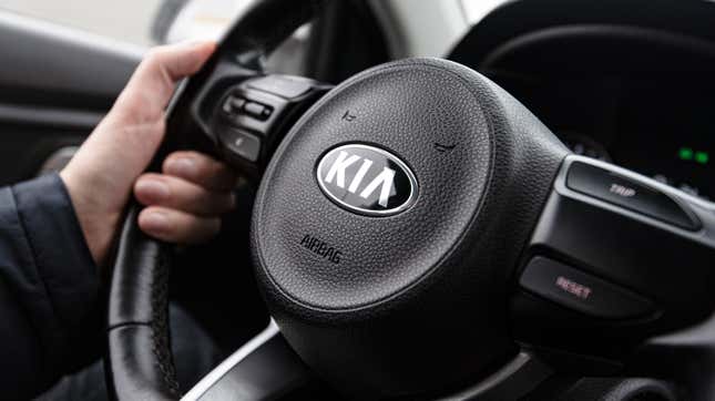 Close-up view of a steering wheel of a Kia vehicle