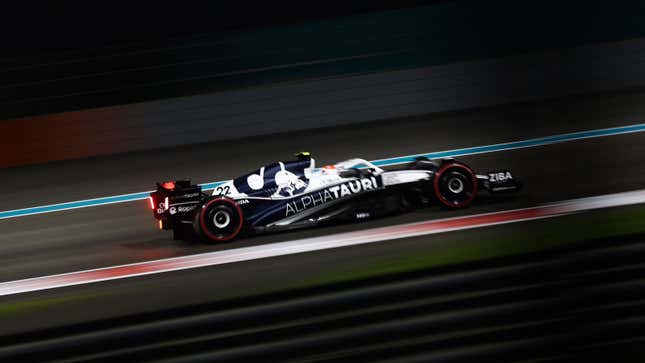 A photo of Yuki Tsunoda racing his 2022 AlphaTauri F1 car. 