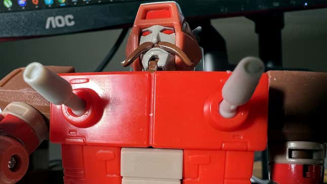 A close-up of Transformers Studio Series Wreck-Gar, featuring large erect chest guns. 
