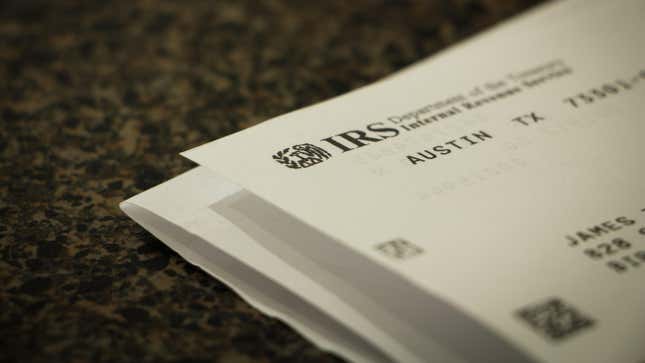 a letter from the IRS laying on a marble countertop