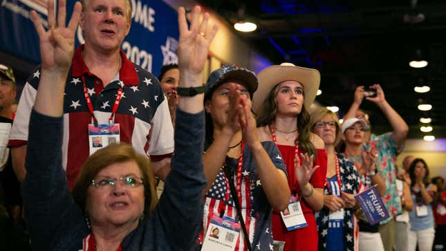 Supporters react as former US President Donald Trump speaks at the Conservative Political Action Conference (CPAC) in Dallas, Texas on July 11, 2021