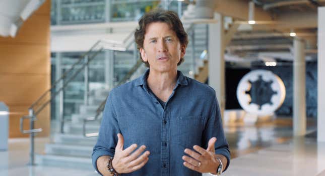 Todd Howard is seen talking into the camera in a Bethesda office.