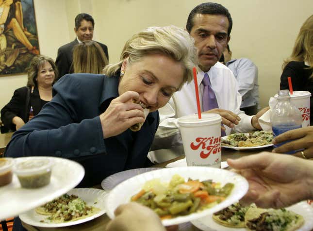 Hillary Clinton eats tacos on the 2008 campaign trail.