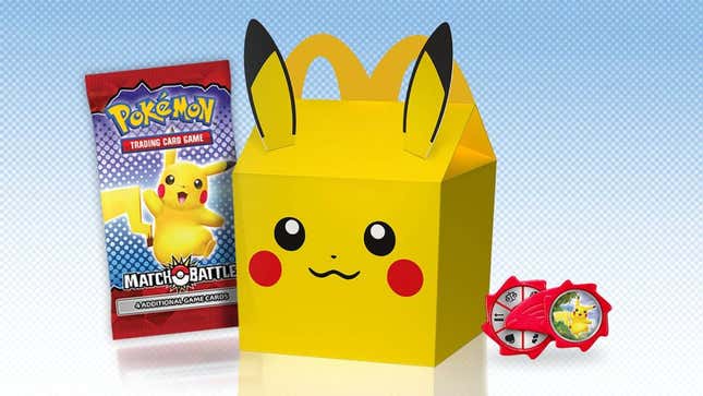A Pikachu printed Happy Meal is displayed with a booster pack and a spinning toy.