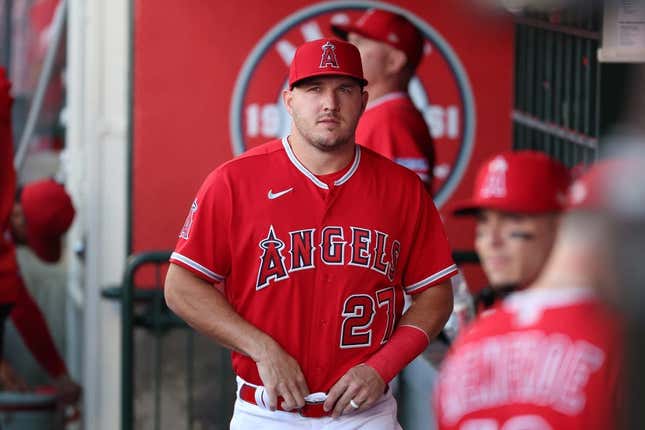 Aug 22, 2023; Anaheim, California, USA;  Los Angeles Angels center fielder Mike Trout (27) in the dugout before the game against the Cincinnati Reds at Angel Stadium.
