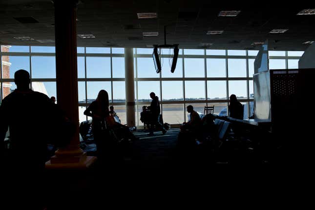 Passengers wait in Montgomery Regional Airport on Nov. 26, 2014, in Montgomery, Ala. 