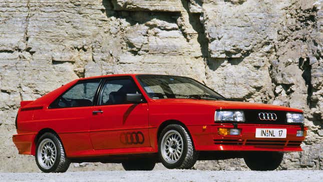 A photo of a red Audi Quattro coupe. 