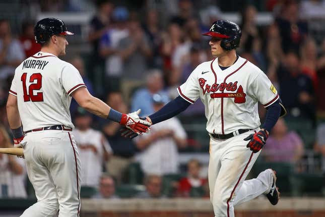 May 25, 2023; Atlanta, Georgia, USA; Atlanta Braves third baseman Austin Riley (27) celebrates with catcher Sean Murphy (12) after a home run against the Philadelphia Phillies in the fifth inning at Truist Park.