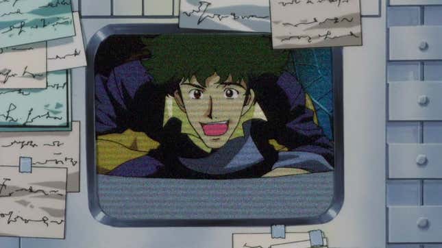 Spike Spiegel excitedly speaking into a video feed being projected on someone's display far away.