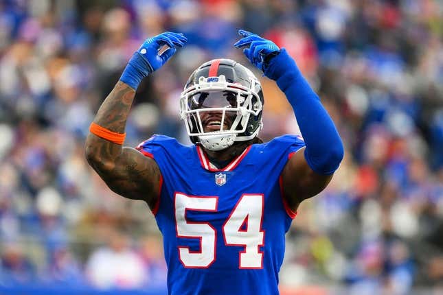 Dec 4, 2022; East Rutherford, New Jersey, USA; New York Giants linebacker Jaylon Smith (54) gestures to the crowd against the Washington Commanders during the second half at MetLife Stadium.