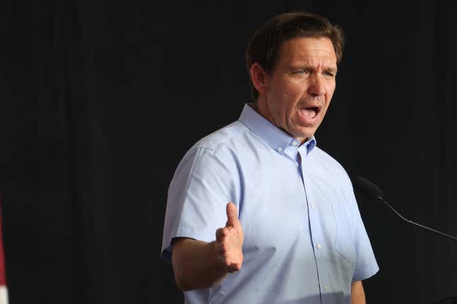 Ron DeSantis at a podium