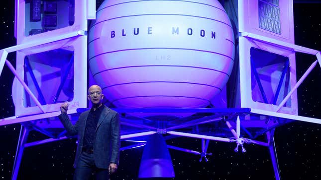 Jeff Bezos stands in front of a Blue Origin lunar lander mock-up in 2019.