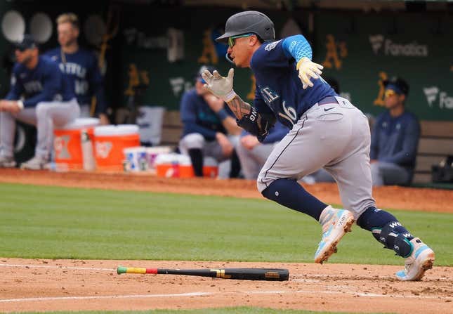 May 4, 2023; Oakland, California, USA; Seattle Mariners second baseman Kolten Wong (16) runs for first base on an RBI single against the Oakland Athletics during the fourth inning at Oakland-Alameda County Coliseum.