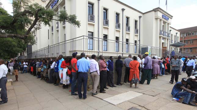 Severe cash shortage and panic over bond notes as replacement currency sees Zimbabwean line up for cash