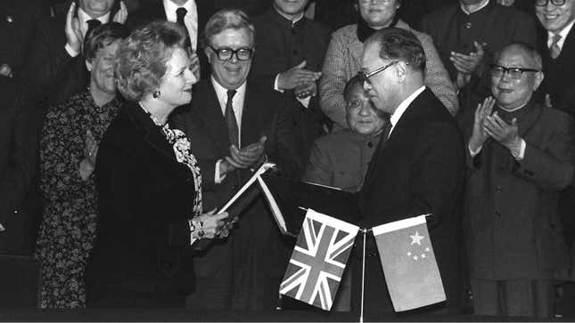 British prime minister Margaret Thatcher and Chinese premier Zhao Ziyang exchange signed copies of the Hong Kong handover agreement in Beijing on Dec. 19, 1984.
