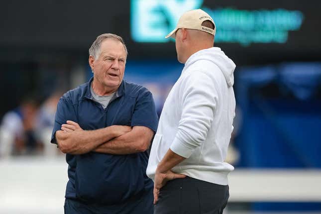 Aug 29, 2021; East Rutherford, New Jersey, USA; New England Patriots head coach Bill Belichick, left, talks with New York Giants head coach Joe Judge before the game at MetLife Stadium.