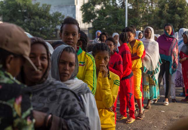 Voters queue early in the morning to cast their votes in Ethiopia's general election, Sunday May 24, 2015, in Addis Ababa