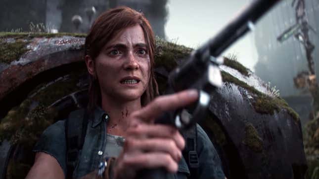 Ellie hides behind a rusted car that has moss growing over it as she brandishes her gun and grimaces as she hypes her self up for a fight.