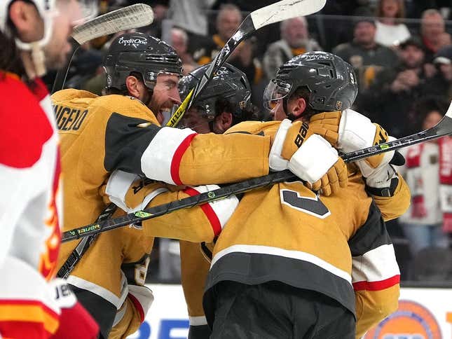 Feb 23, 2023; Las Vegas, Nevada, USA; Vegas Golden Knights defenseman Alex Pietrangelo (7) celebrates with Vegas Golden Knights right wing Jonathan Marchessault (81) and Vegas Golden Knights center Jack Eichel (9) after scoring a goal against the Calgary Flames in overtime to give the Golden Knights a 4-3 victory at T-Mobile Arena.
