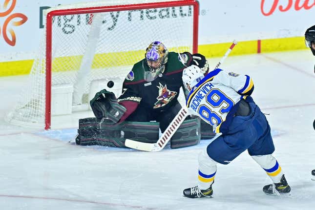 Mar 7, 2023; Tempe, Arizona, USA;  St. Louis Blues left wing Pavel Buchnevich (89) scores on Arizona Coyotes goaltender Karel Vejmelka (70) in the first period at Mullett Arena.