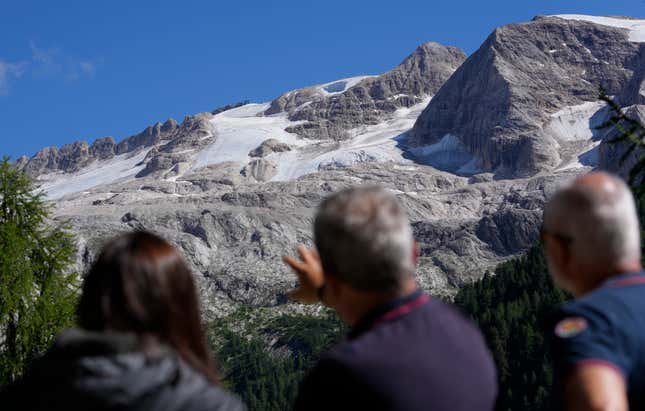 People look at the glacier on Marmolada on July 4.