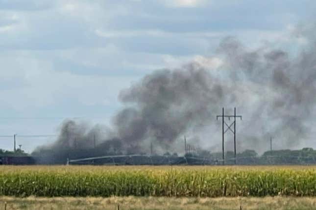 Smoke rises after an explosion at Union Pacific's Bailey Yard in North Platte, Neb., Thursday, Sept. 14, 2023. An explosion Thursday inside a shipping container generated toxic smoke and forced evacuations. (Melanie Standiford/Midwest Media via AP)