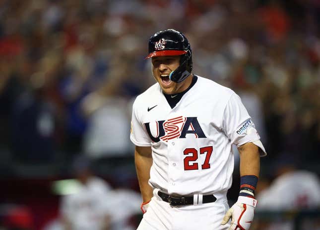 Mar 13, 2023; Phoenix, Arizona, USA; USA outfielder Mike Trout celebrates after hitting a three run home run in the first inning against Canada during the World Baseball Classic at Chase Field.