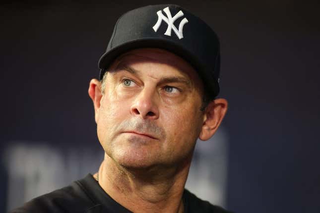 Aug 14, 2023; Atlanta, Georgia, USA; New York Yankees manager Aaron Boone (17) in the dugout against the Atlanta Braves in the third inning at Truist Park.