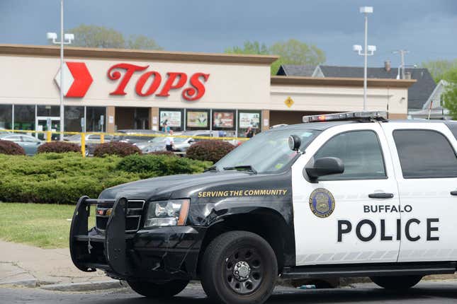 BUFFALO, NY - MAY 14: Buffalo Police on scene at a Tops Friendly Market on May 14, 2022, in Buffalo, New York. According to reports, at least ten people were killed after a mass shooting at the store, with the shooter in police custody.