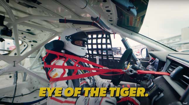 An emotional man sits in a racing car as he prepares for his first race.