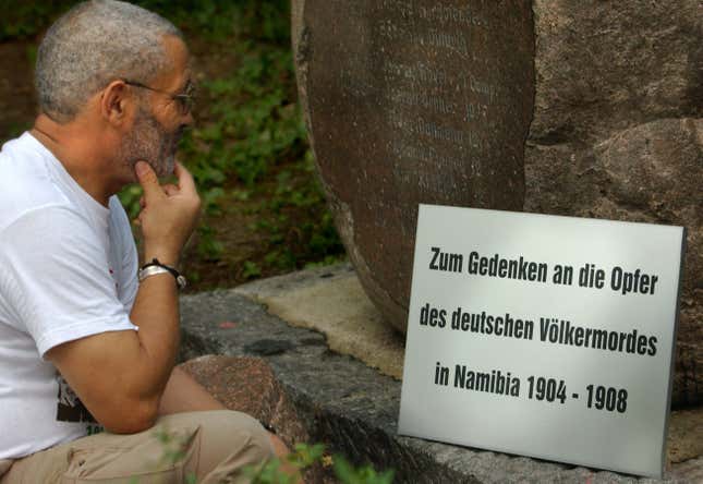 A descendant looks at a recently erected monument to the Herero.