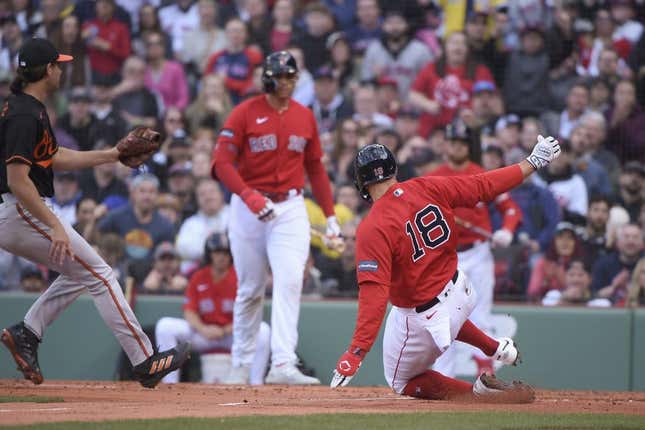 Apr 1, 2023; Boston, Massachusetts, USA;  Boston Red Sox center fielder Adam Duvall (18) scores a run on a wild pitch during the second inning against the Baltimore Orioles at Fenway Park.