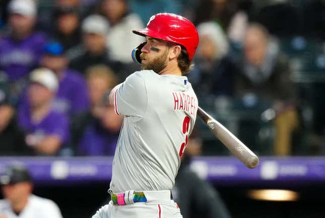 May 12, 2023; Denver, Colorado, USA; Philadelphia Phillies designated hitter Bryce Harper (3) doubles in the seventh inning against the Colorado Rockies at Coors Field.