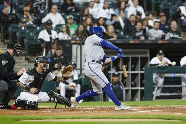Sep 13, 2023; Chicago, Illinois, USA; Kansas City Royals second baseman Michael Massey (19) hits a two-run home run against the Chicago White Sox during the second inning at Guaranteed Rate Field.