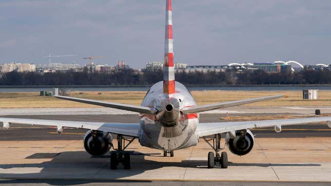 A plane sits at Ronald Reagan Washington National Airport in Arlington, Virginia, on January 18, 2022.