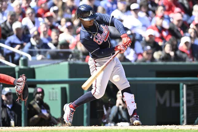 Mar 30, 2023; Washington, District of Columbia, USA; Atlanta Braves second baseman Ozzie Albies (1) hits an RBI single against the Washington Nationals during the second inning at Nationals Park.