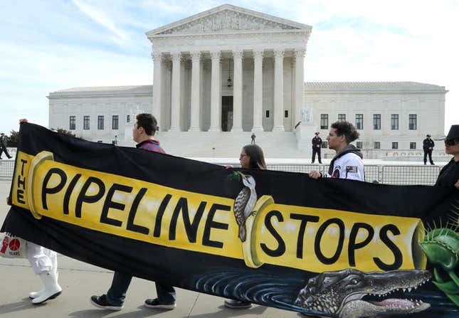 Climate activist groups protest in front of the U.S. Supreme Court as oral arguments are heard in U.S. Forest Service and Atlantic Coast Pipeline, LLC v. Cowpasture River Assn. case, on February 24, 2020 in Washington, DC.