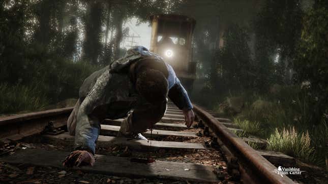 A man crouches down on a pair of train tracks to look for clues. 