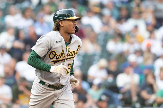 Oct 2, 2022; Seattle, Washington, USA; Oakland Athletics center fielder Cristian Pache (20) runs towards first base after walking against the Seattle Mariners during the eighth inning at T-Mobile Park.