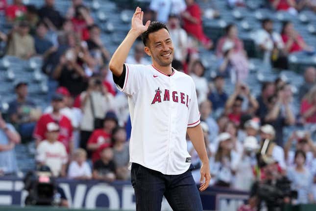 Aug 8, 2023; Anaheim, California, USA; LA Galaxy defender Maya Yoshida gestures after throwing the ceremonial first pitch before the game between the Los Angeles Angels and the San Francisco Giants at Angel Stadium.