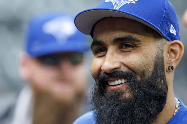 Jul 8, 2022; Seattle, Washington, USA; Toronto Blue Jays relief pitcher Sergio Romo (54) talks with teammates before batting practice against the Seattle Mariners at T-Mobile Park.