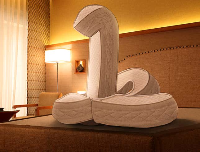 Image for article titled Luxury Hotel Maid Folds Mattress Into Swan
