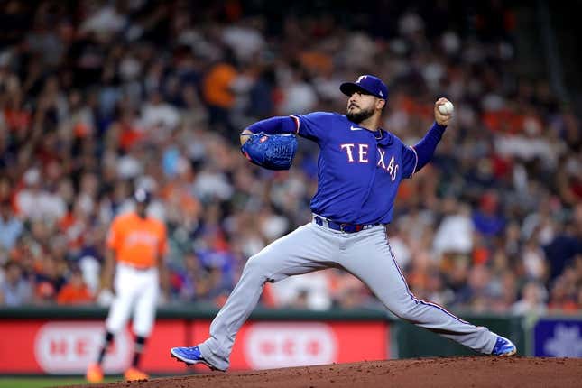 Apr 14, 2023; Houston, Texas, USA; Texas Rangers starting pitcher Martin Perez (54) delivers a pitch against the Houston Astros during the first inning at Minute Maid Park.