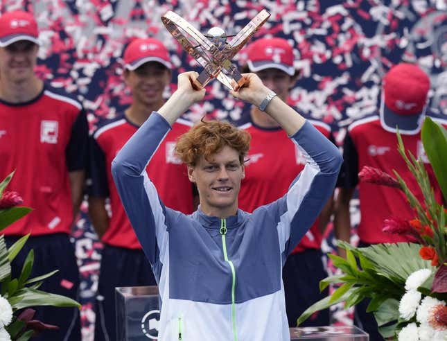 Aug 13, 2023; Toronto, Ontario, Canada; Jannik Sinner (ITA) hoists the National Bank Open trophy after defeating Alex de Minaur (not pictured) in the championship game at Sobeys Stadium.