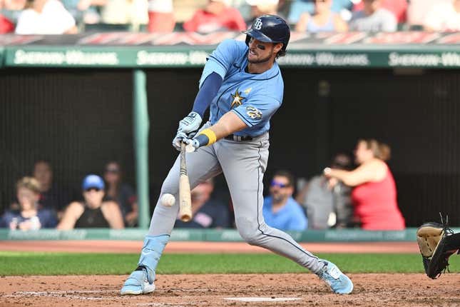 Sep 3, 2023; Cleveland, Ohio, USA; Tampa Bay Rays right fielder Josh Lowe (15) hits a single during the fourth inning against the Cleveland Guardians at Progressive Field.